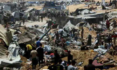 Israeli strike kills at least two at Gaza seaport cafe, medics say