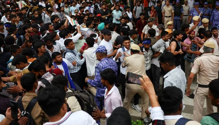 Police cane supporters of India’s cockroach movement as thousands gather for march