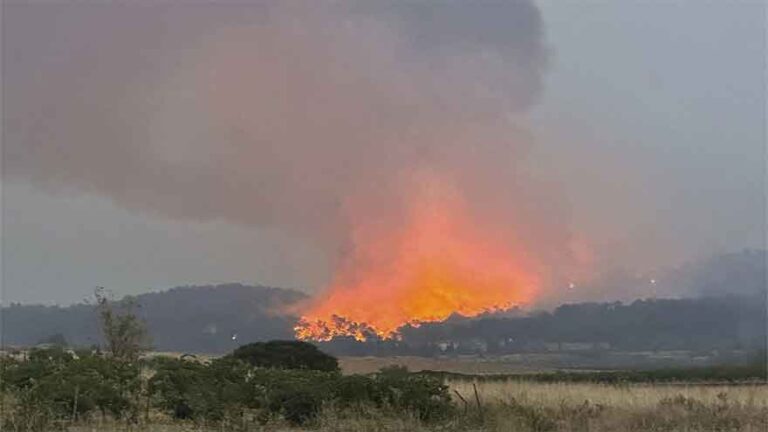 Tens of thousands of French wildfire evacuees allowed to return home as cooler weather moves in